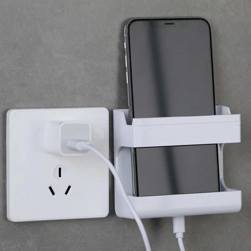 Organisateur mural multifonctionnel pour télécommandes et téléphones mobiles