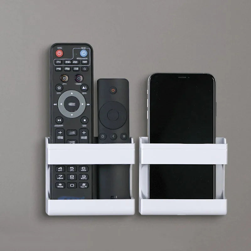 Organisateur mural multifonctionnel pour télécommandes et téléphones mobiles